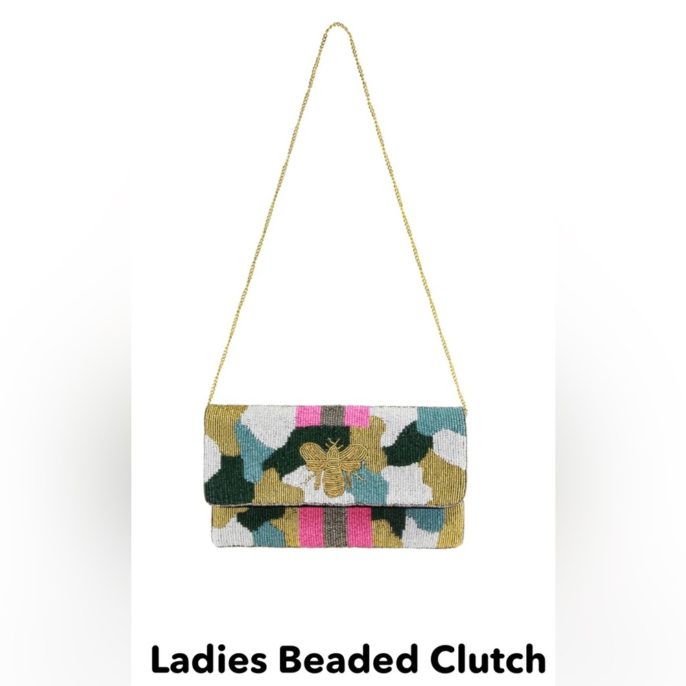 Cross body/ clutch /wristlet - fun to pair with white shirt and light jeans!